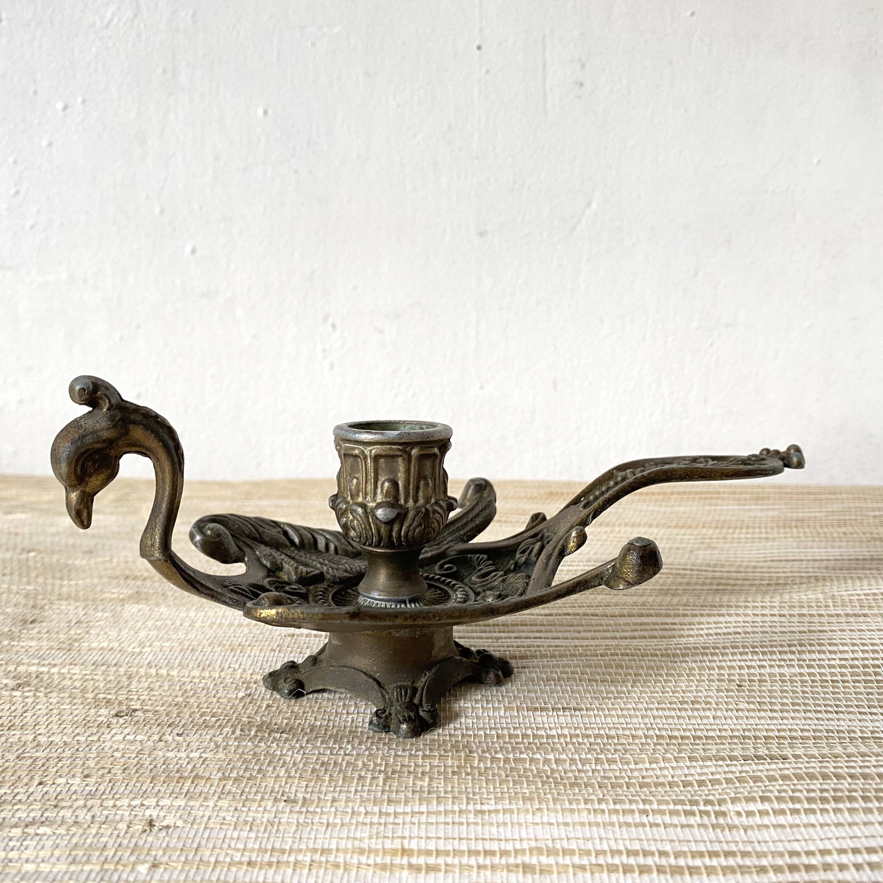 Brass bird candle holder