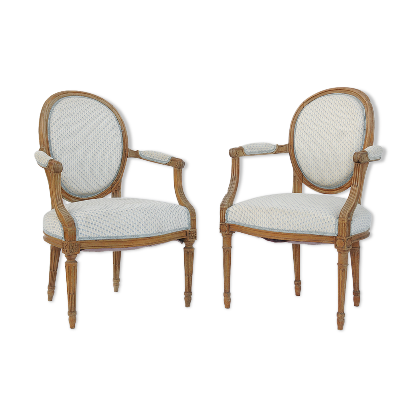 Paire de fauteuils cabriolets de style Louis XVI