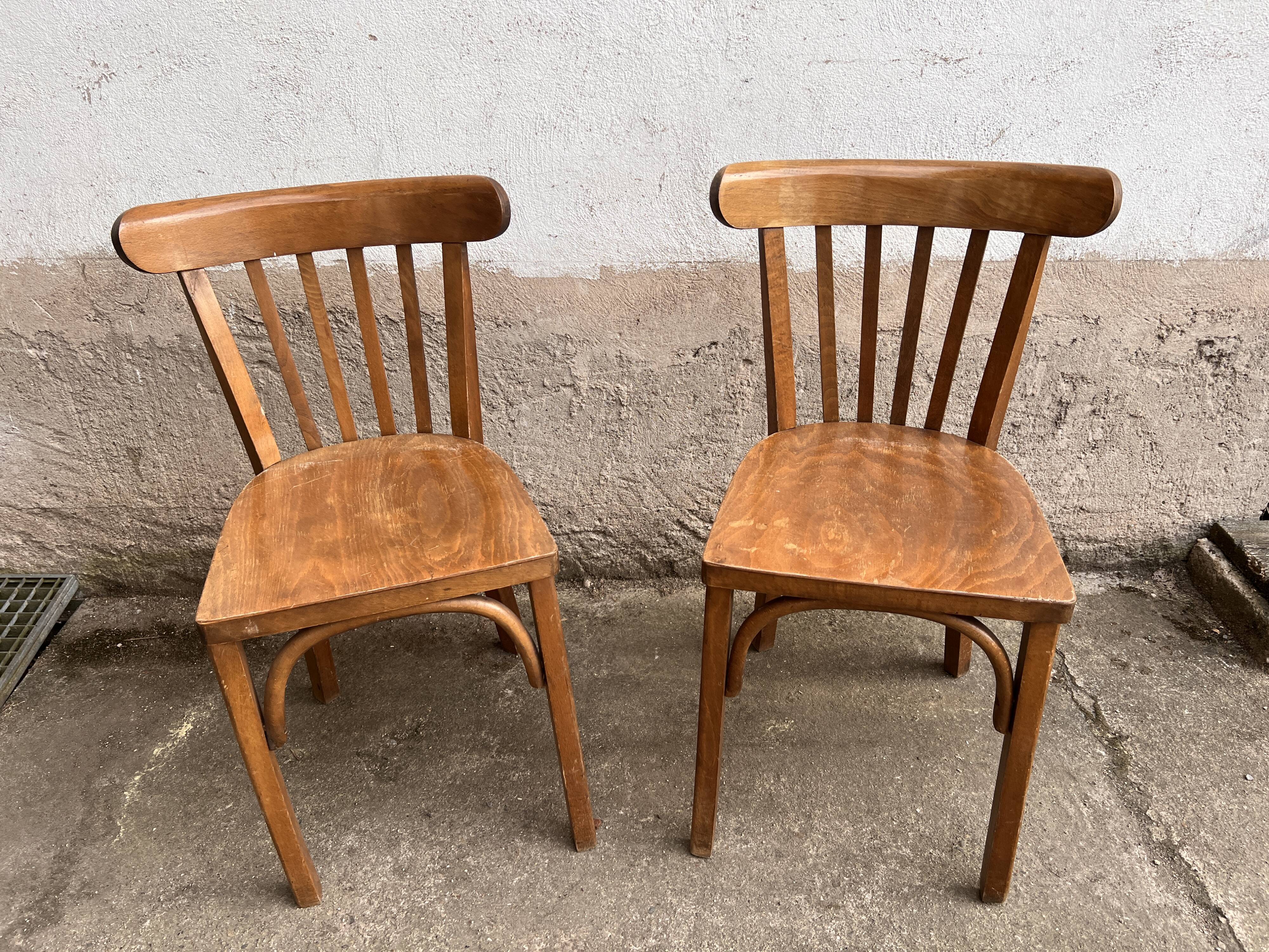 Pair of vintage wooden bistro chairs