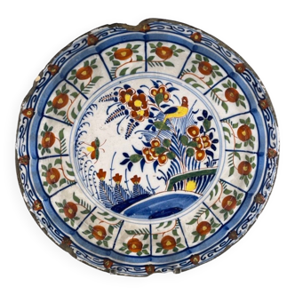 18th century Delft earthenware dish decorated with flowers and bird