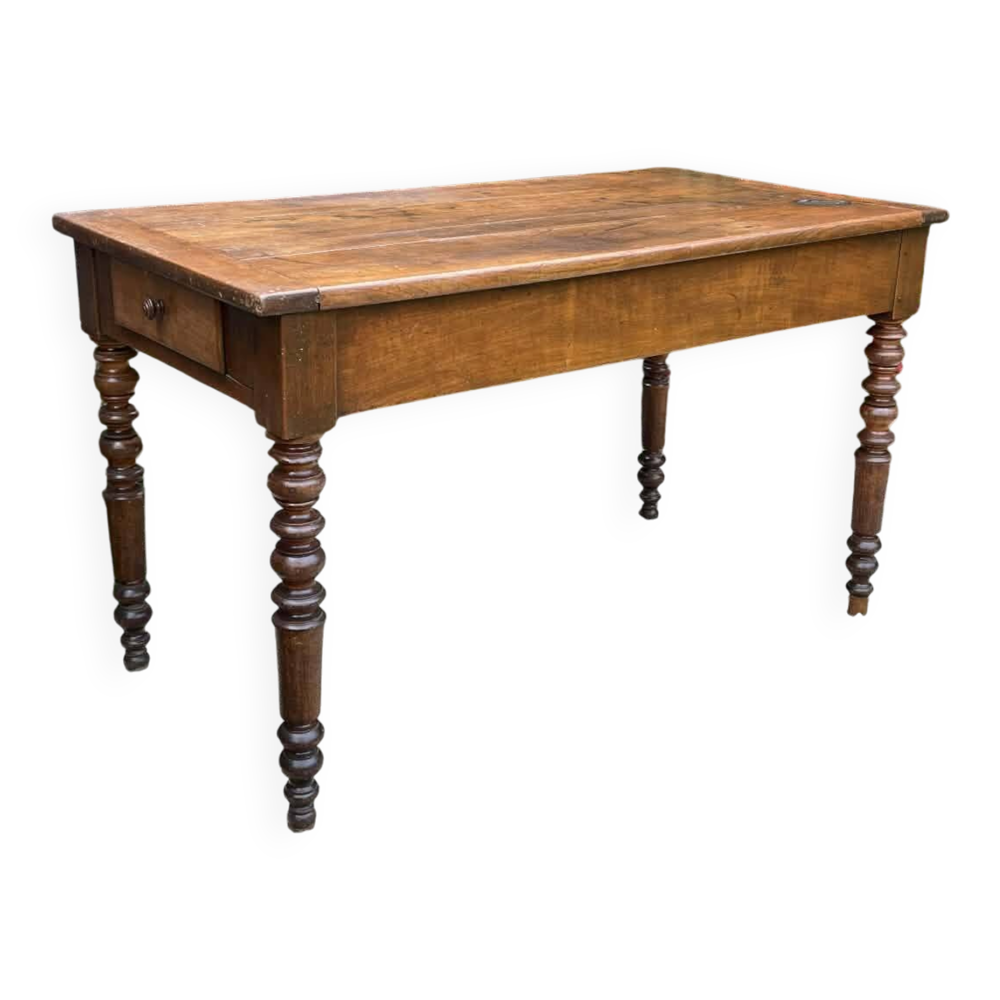 Old kitchen table with chopping board.