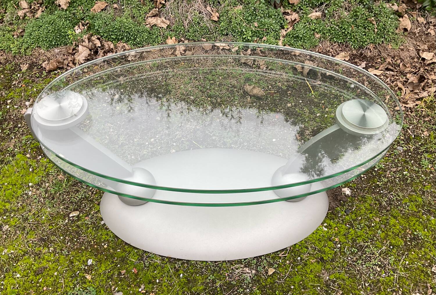 Naos designer coffee table in tempered glass and cast iron