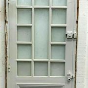 Porte de service à petits carreaux et imposte vitrée XX siècle