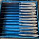 Service 12 couteaux de table argent guilloché Paris XIXe coffret