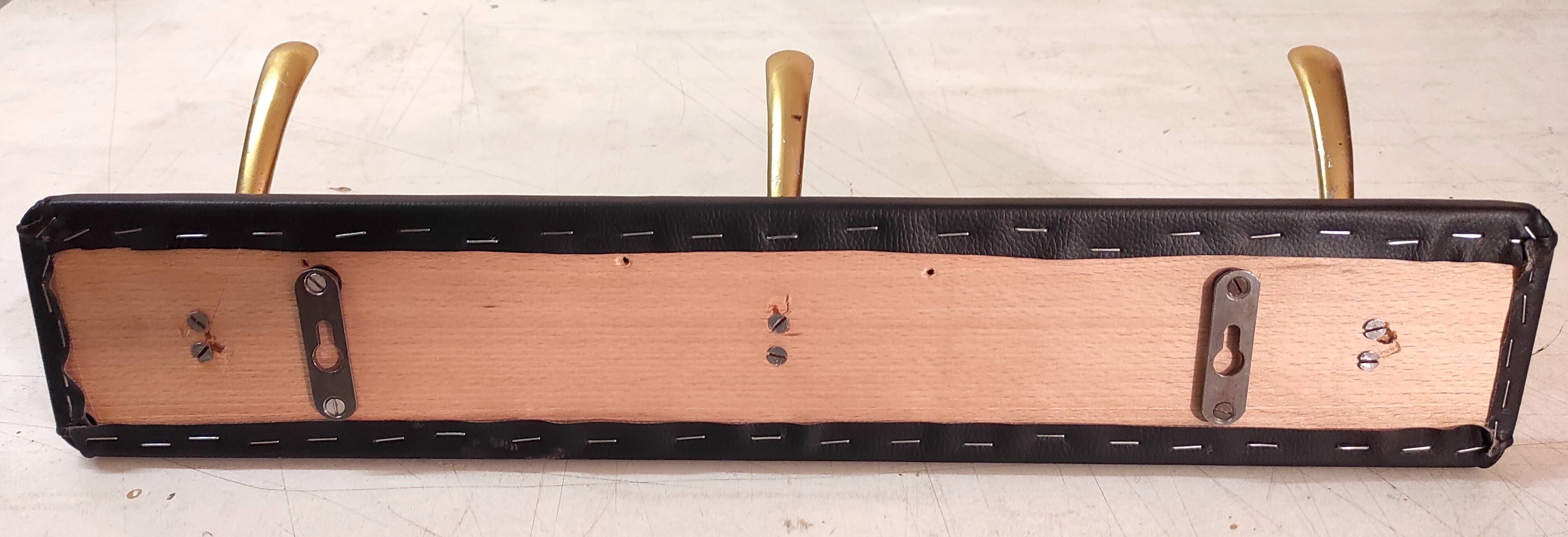Wall-mounted coat rack in brass, 1950s-60s