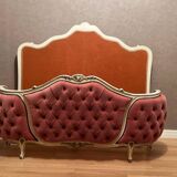 Upholstered bed in rosewood fabric