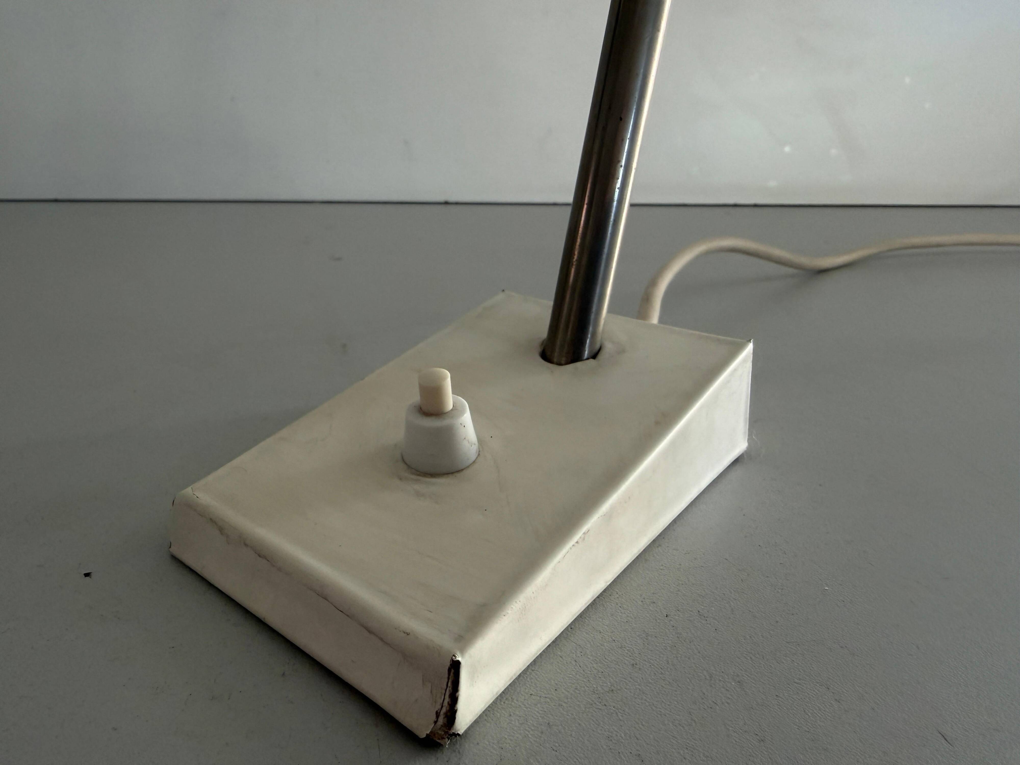 Table lamp with a red metal head, 1960, Germany