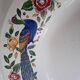Large oval white ceramic platter, decorated with peacocks and vintage flowers