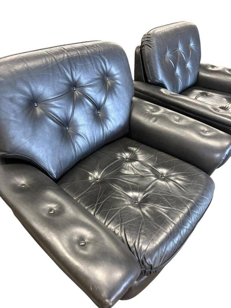 Set of 2 vintage black leather armchairs / individual armchairs