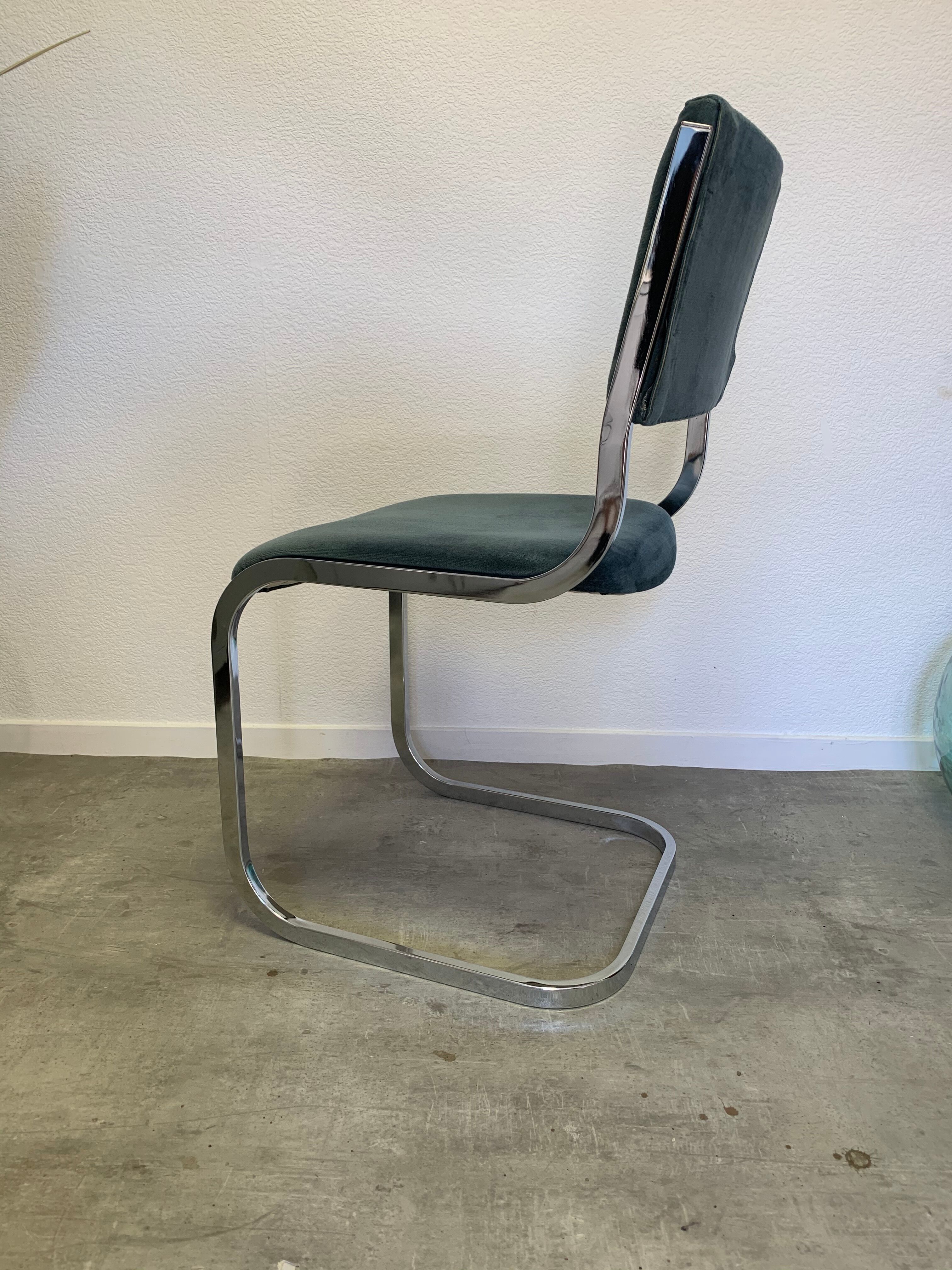 Pair of chrome blue chairs  70