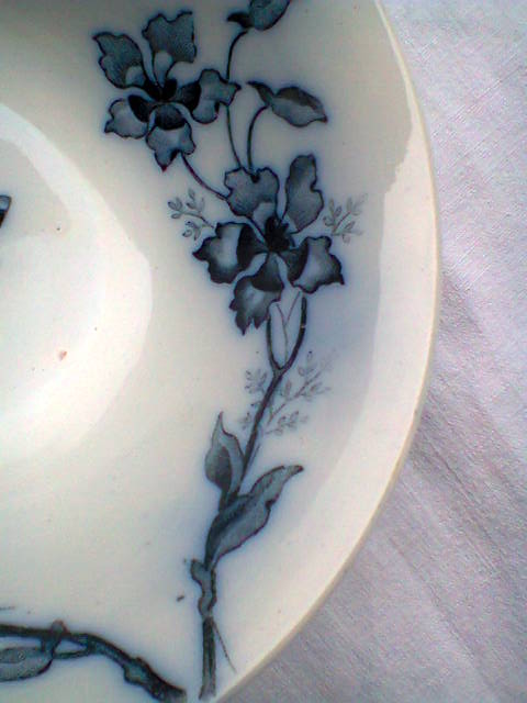 Ramekin in earthenware with decoration of flowers, butterflies and birds