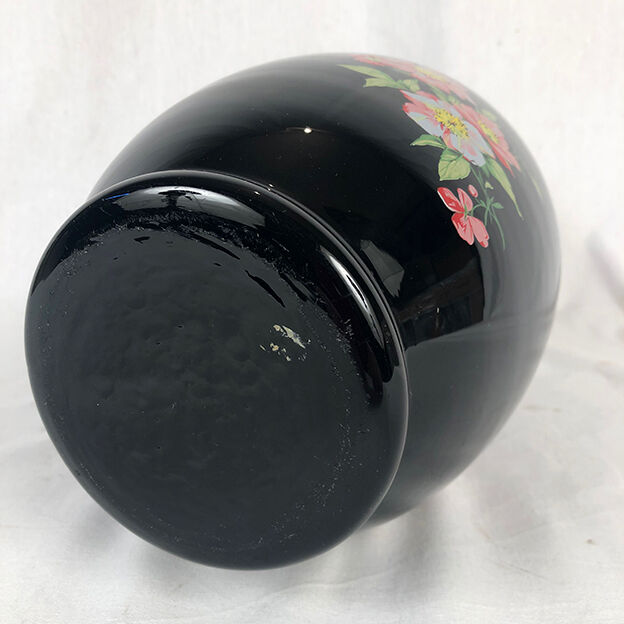 Black opal vase decorated with flowers