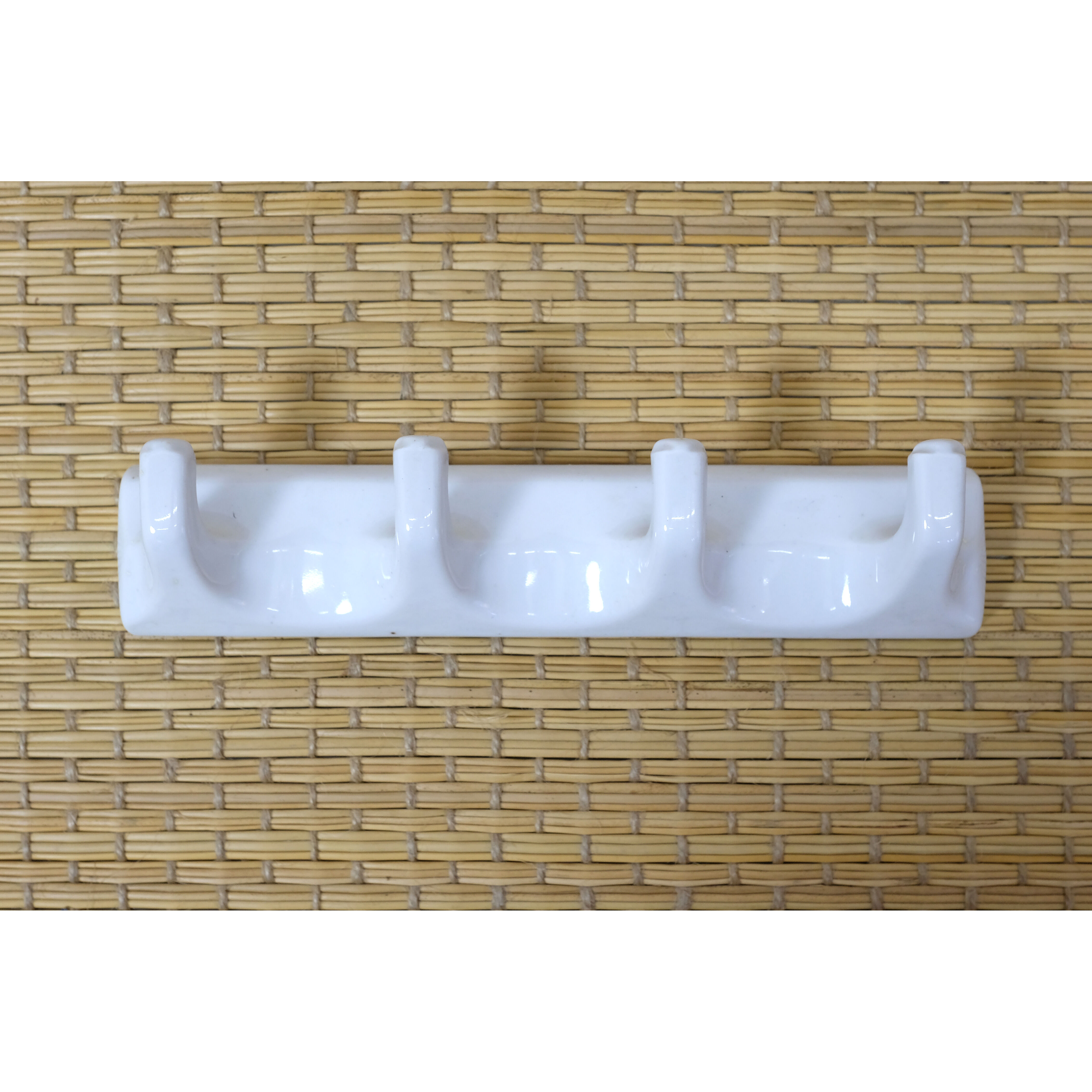 Tea towel holder or porcelain towel with 4 hooks.