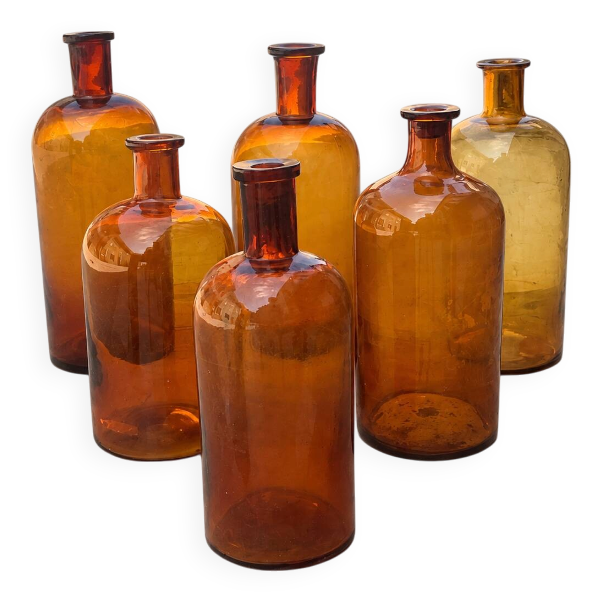 Set of 6 antique amber glass apothecary bottles.