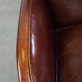 Subtle sheep leather armchair with a beautiful finish and a good patina