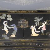 Black lacquered Chinese buffet with stone and ivory figures