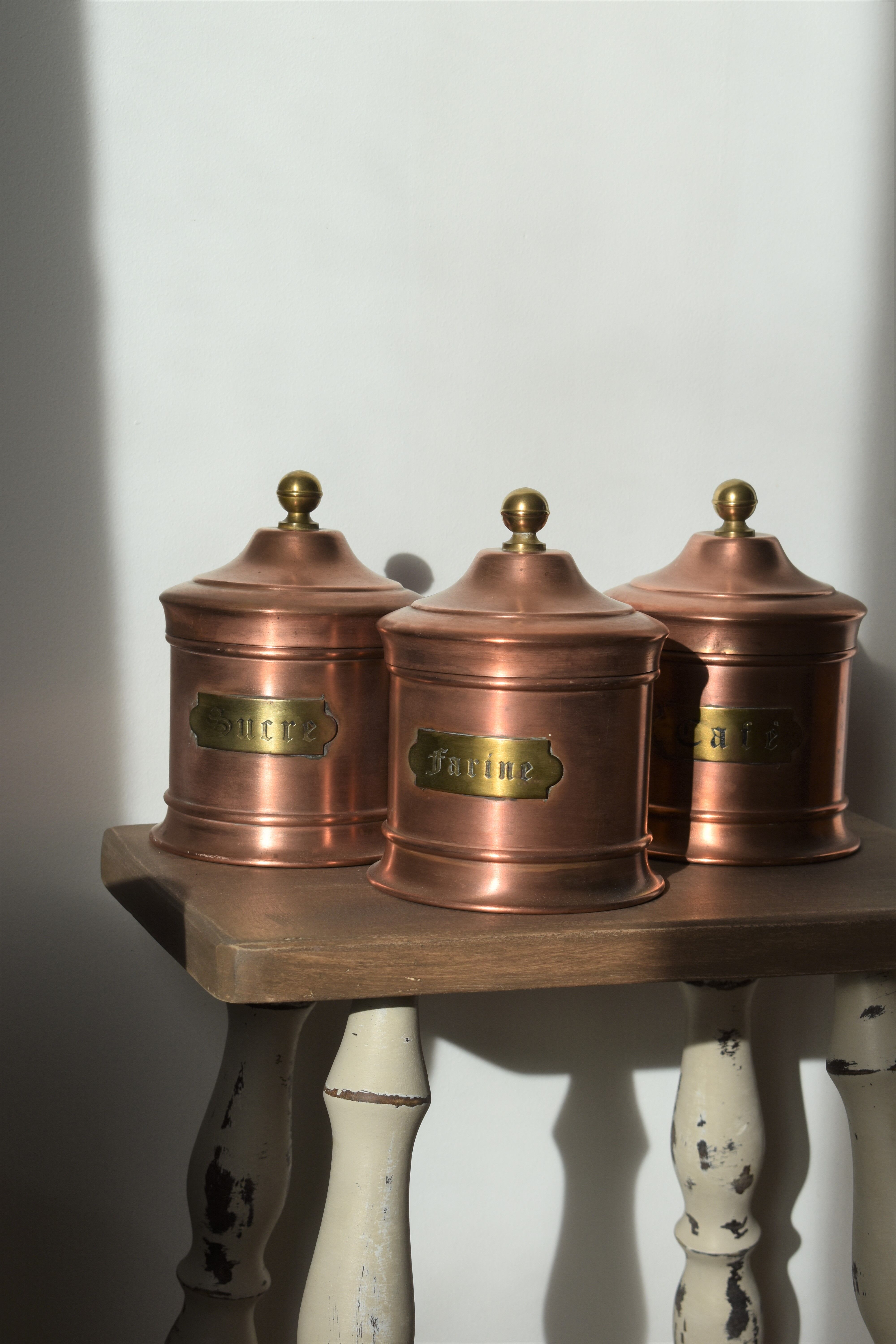Trio of copper spice pots