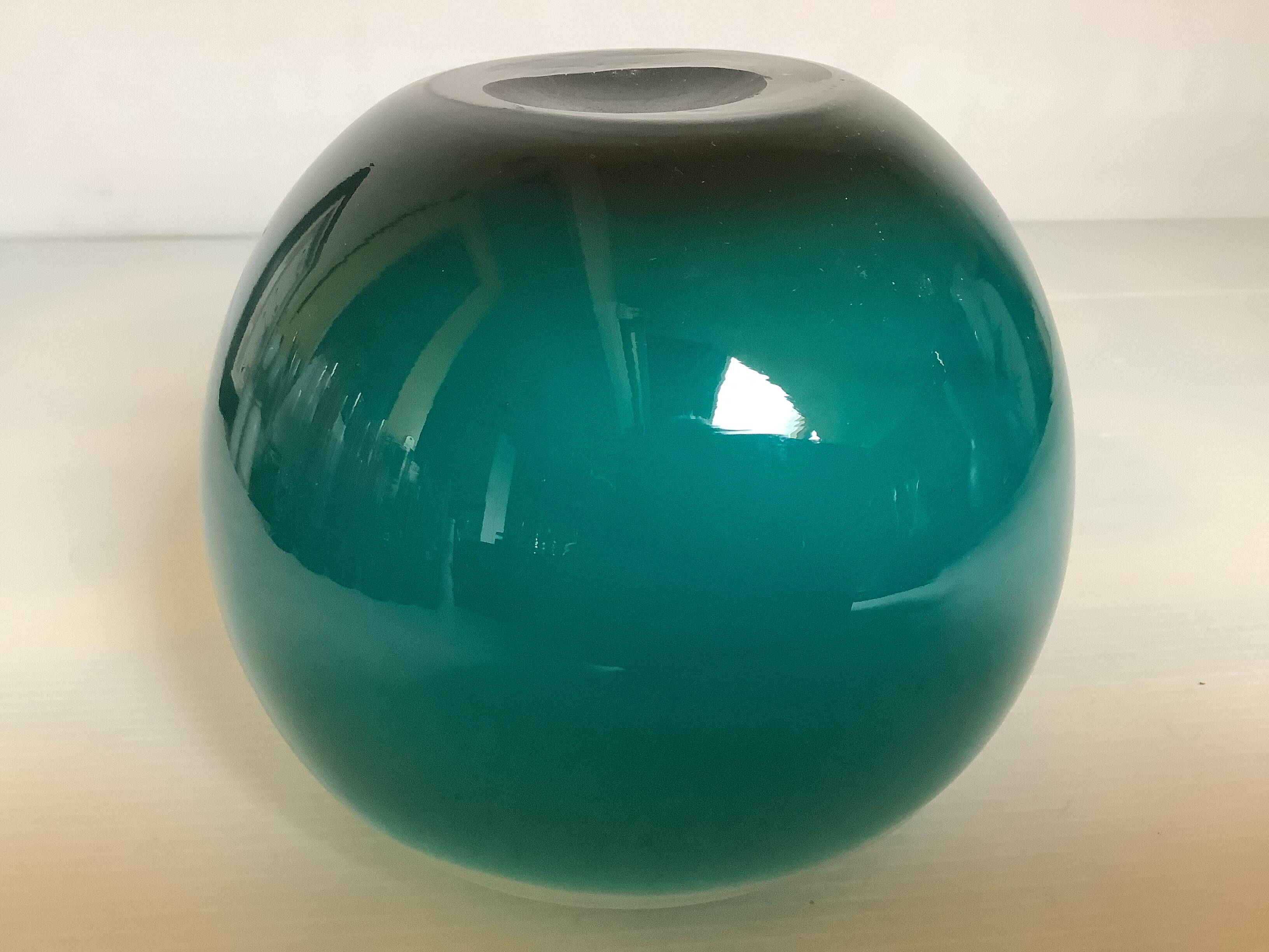 Small turquoise blue Murano style vase