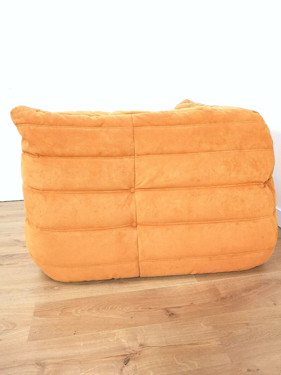 Togo corner armchair in "peach skin" by Michel Ducaroy for Ligne Roset