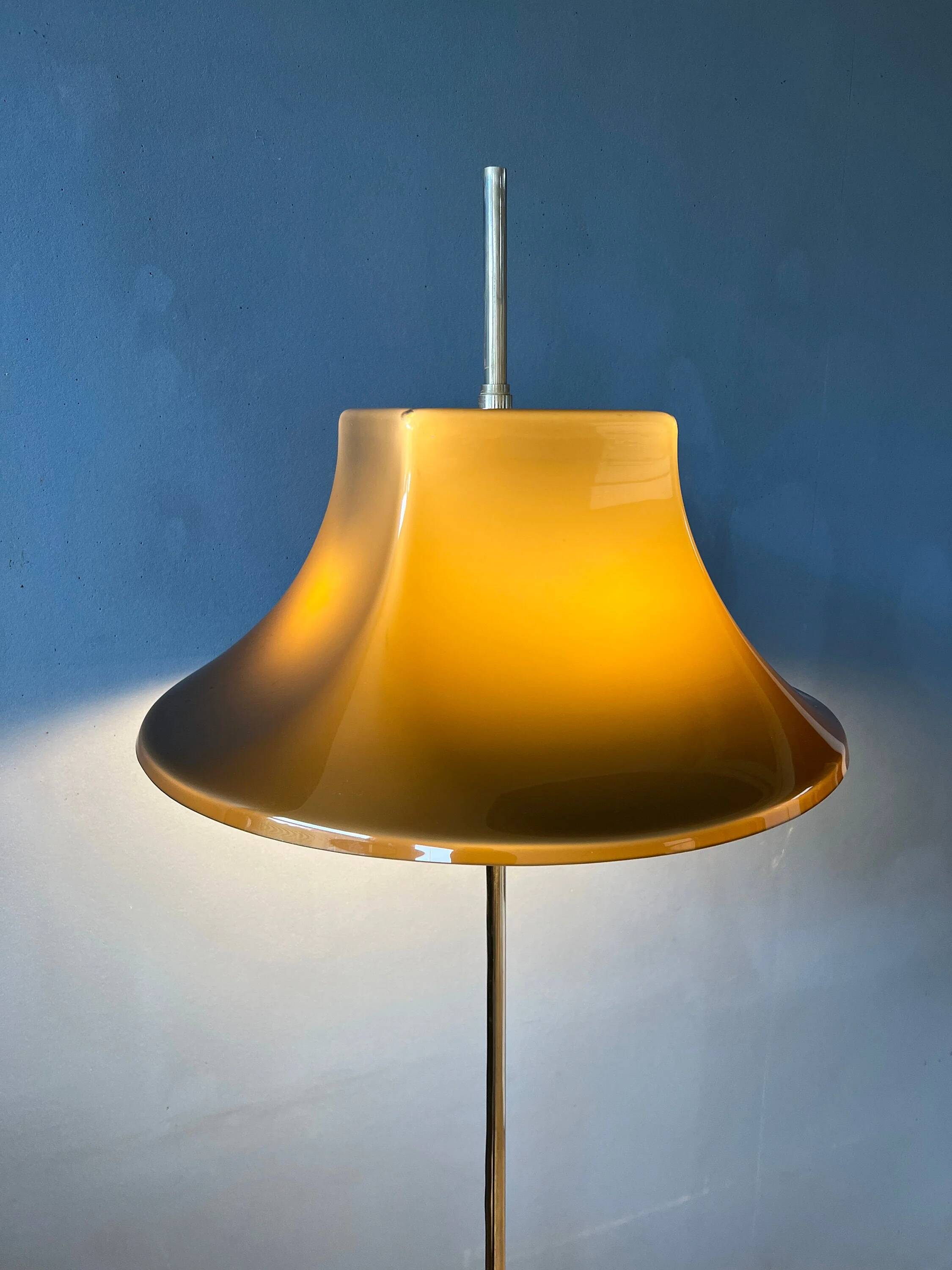 Space Age floor lamp by Willem Hagoort with a beige witch hat-shaped shade.