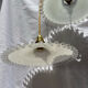 Vintage wavy opaline suspension pair with brass claw