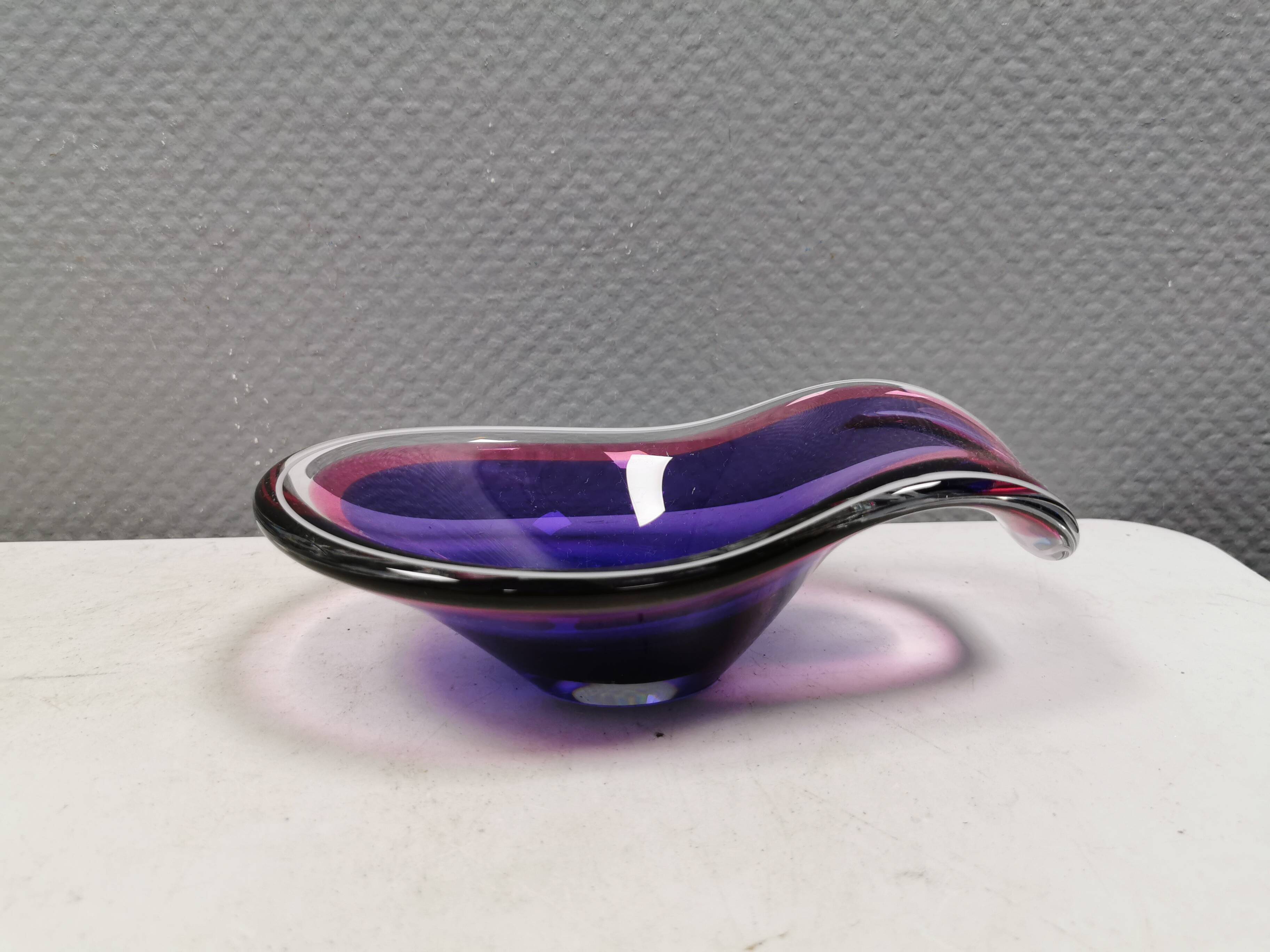 Beautiful dish/bowl in many coloured glass.