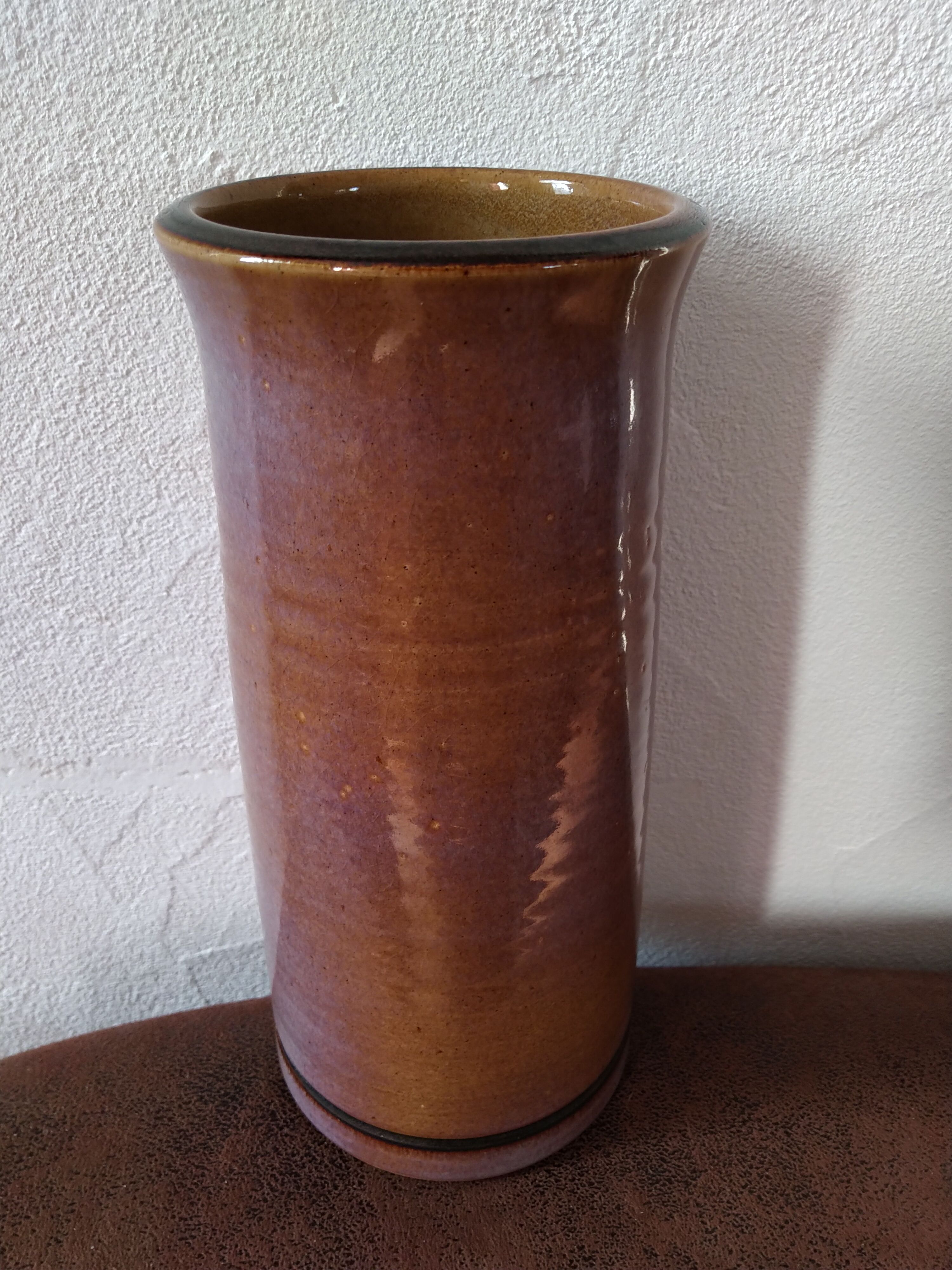 Purple enamelled sandstone vase