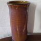 Purple enamelled sandstone vase