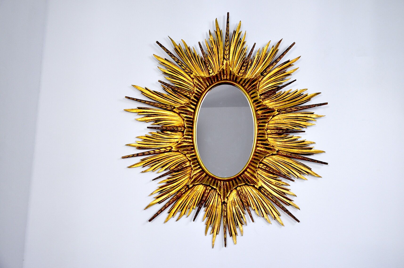 Miroir soleil et épis en bois dorée début XXème 99cm