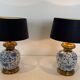 Pair of porcelain lamps with Chinese-style decorations and brass.