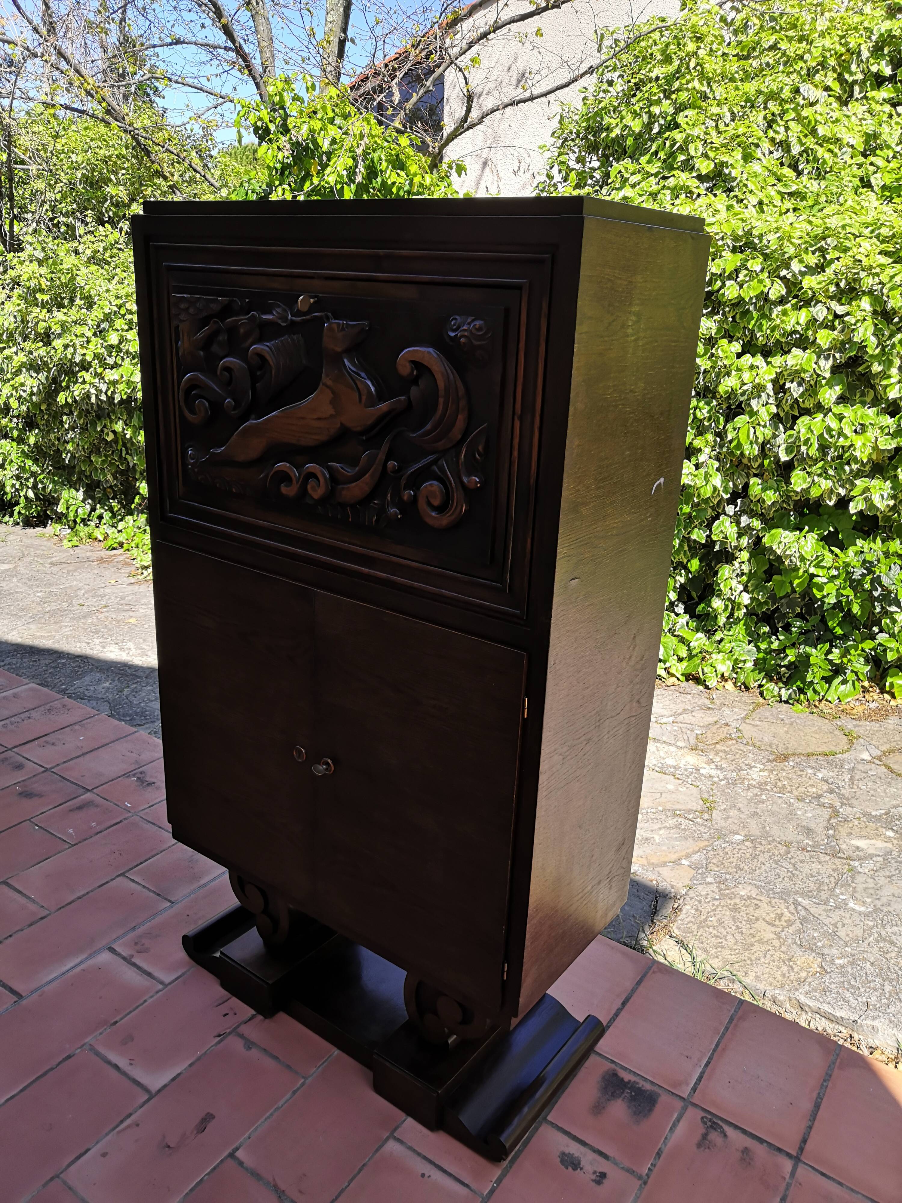 Vintage Art Deco carved bar cabinet
