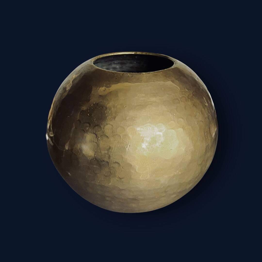Antique decorative round vase in hammered brass