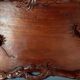 Ancient wooden tray carved with Chinese dragons around 1900