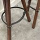 Set of 3 rustic carved oak bar stools with iron footrests, 1970s