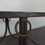 Neoclassical side table in wrought iron and eglomisé glass.