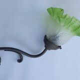 Antique brass wall light with art deco molded glass