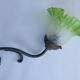 Antique brass wall light with art deco molded glass