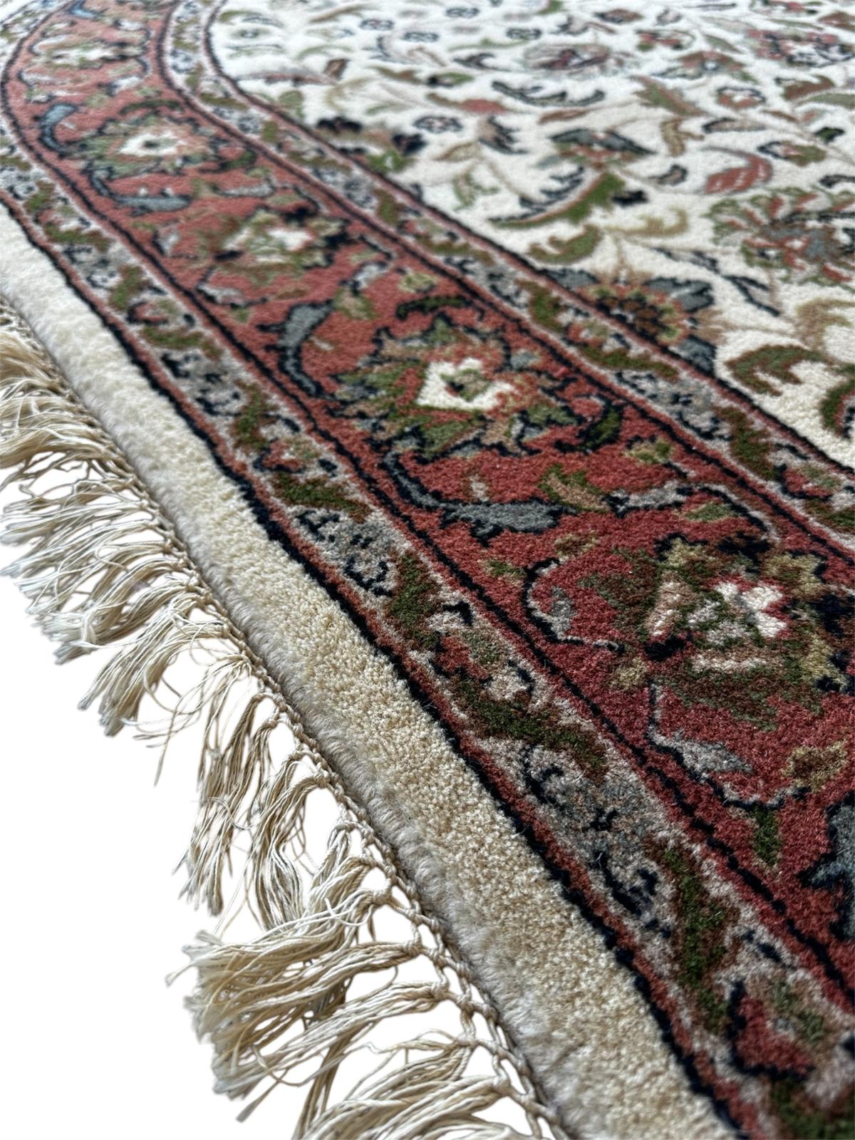 Handmade oval Persian rug 185cm x 120cm