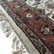 Handmade oval Persian rug 185cm x 120cm