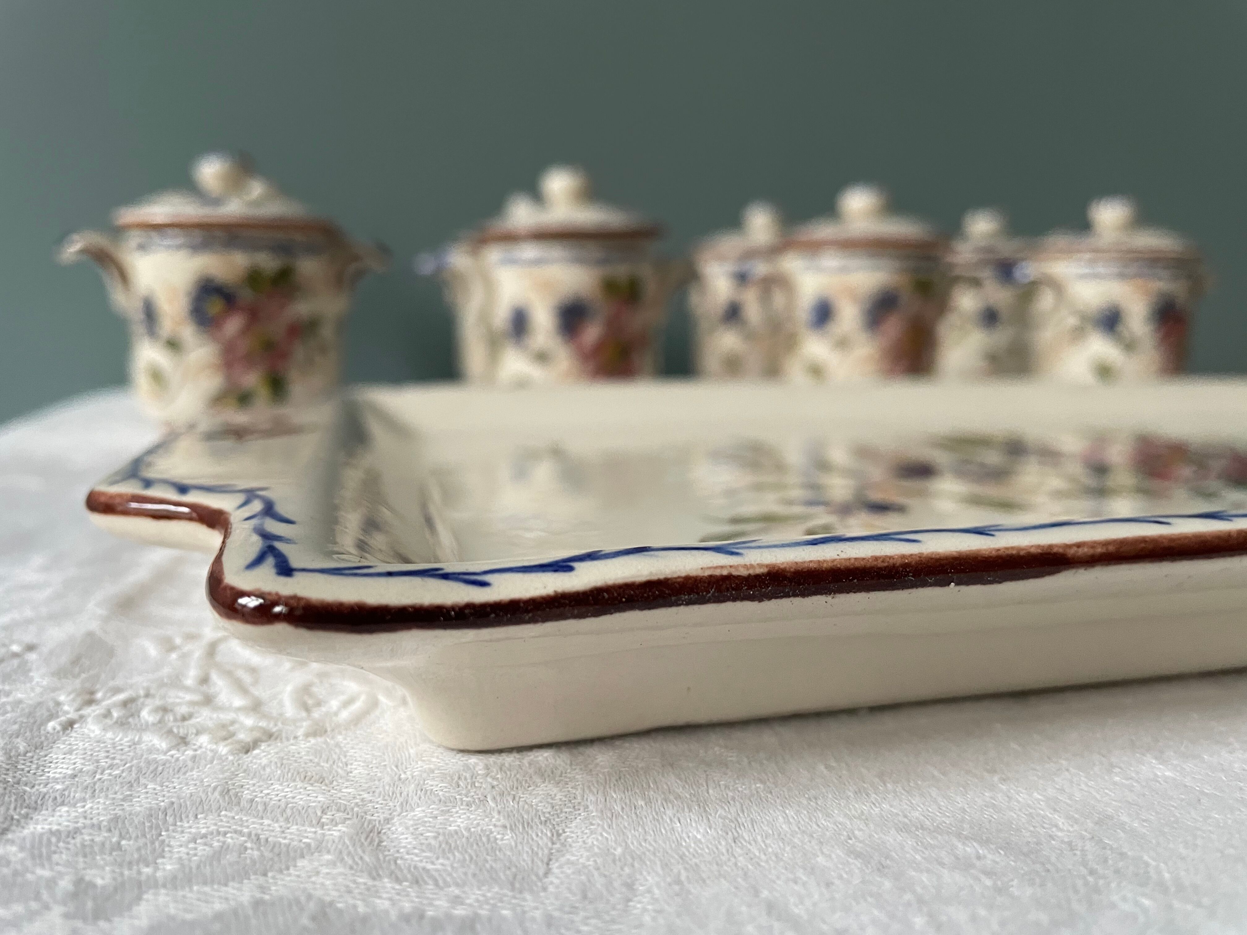 Service old cream jars