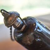 Pair of black enamelled sheet metal pendant lights from the 1950s.