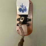 Old wall-mounted coffee grinder