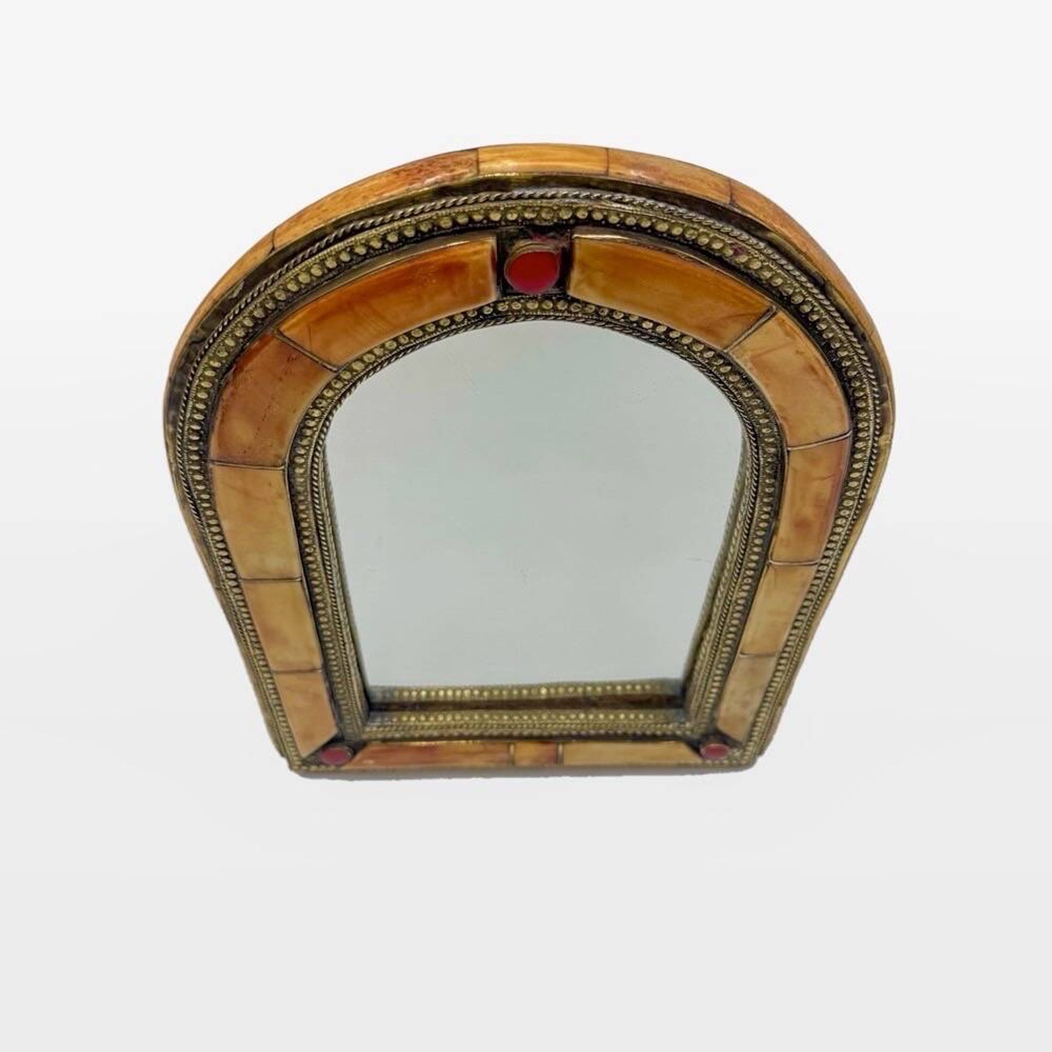 Moroccan brass mirror from the 1980s.
