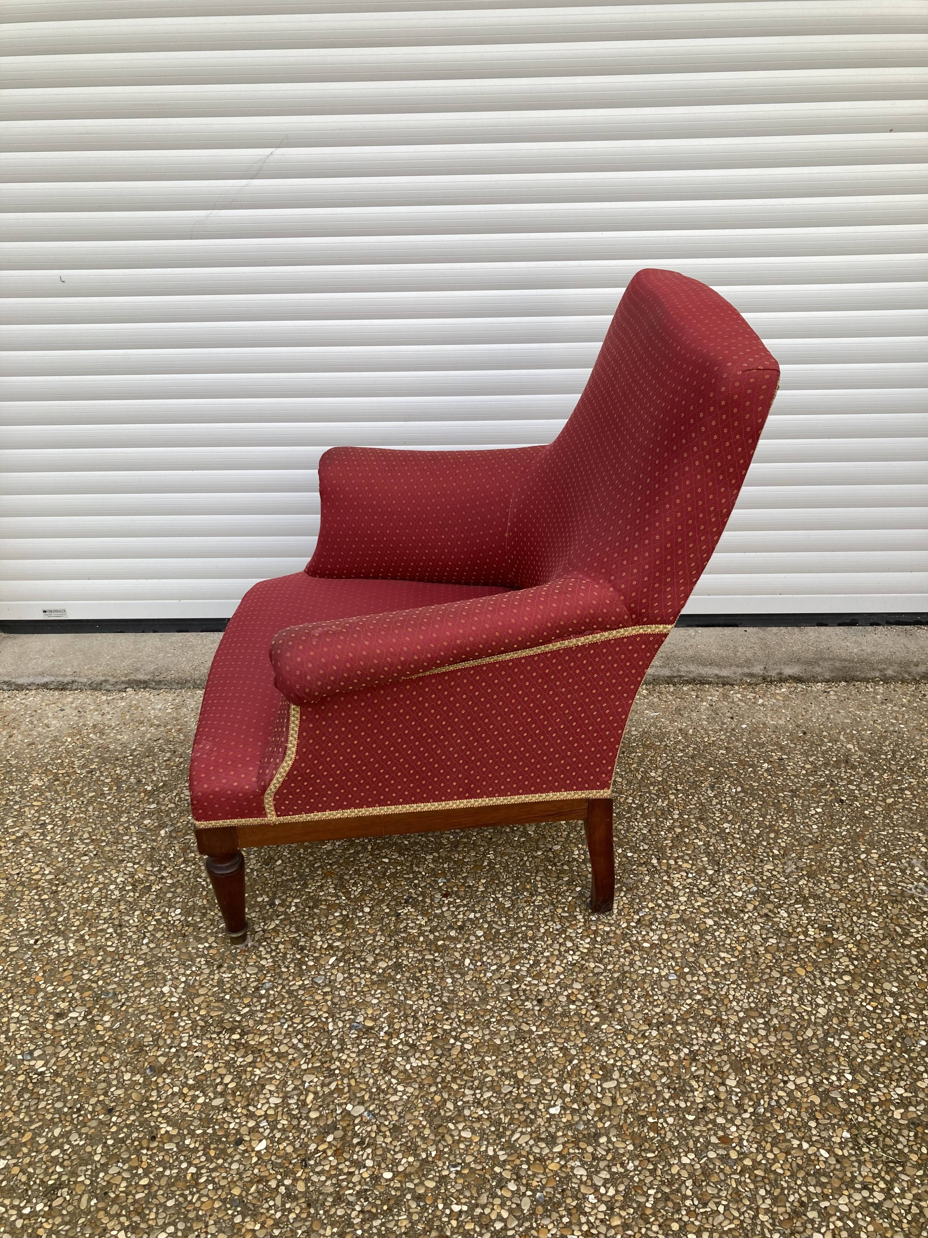 Antique upholstered armchair