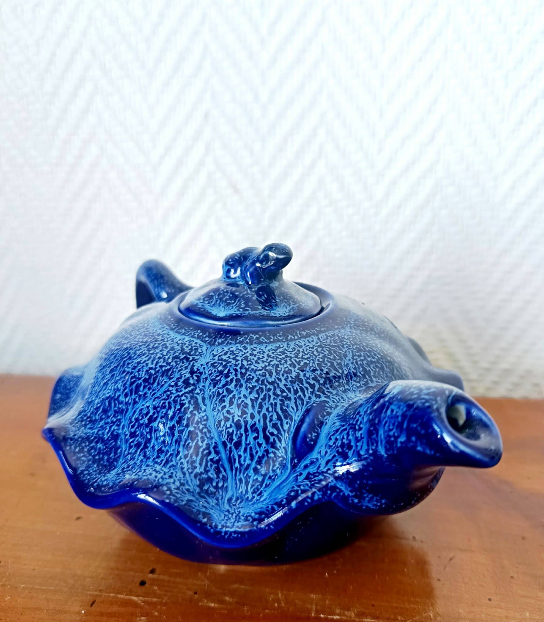 Blue ceramic Art Deco teapot with a frog.
