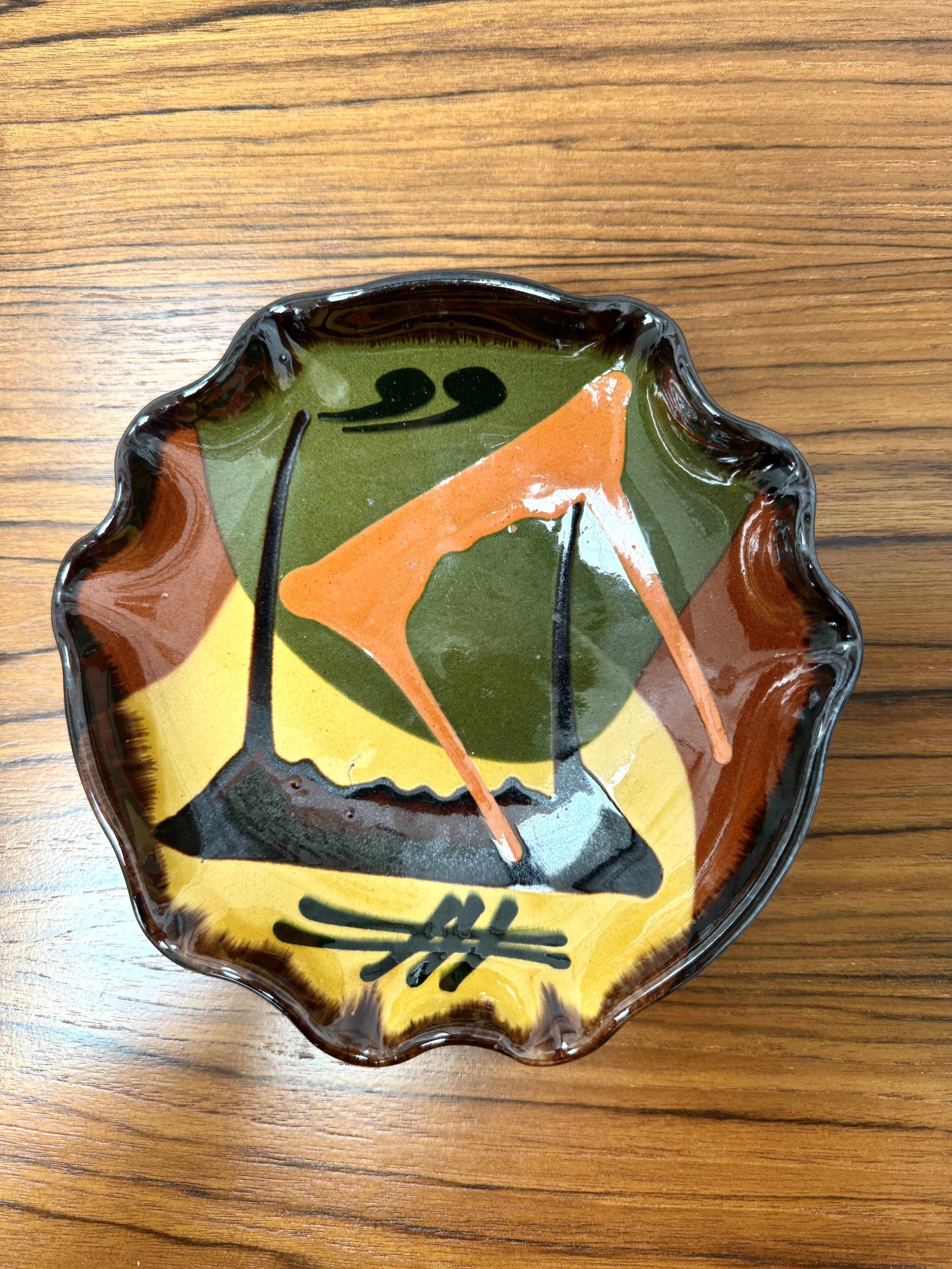 Terracotta pocket emptier