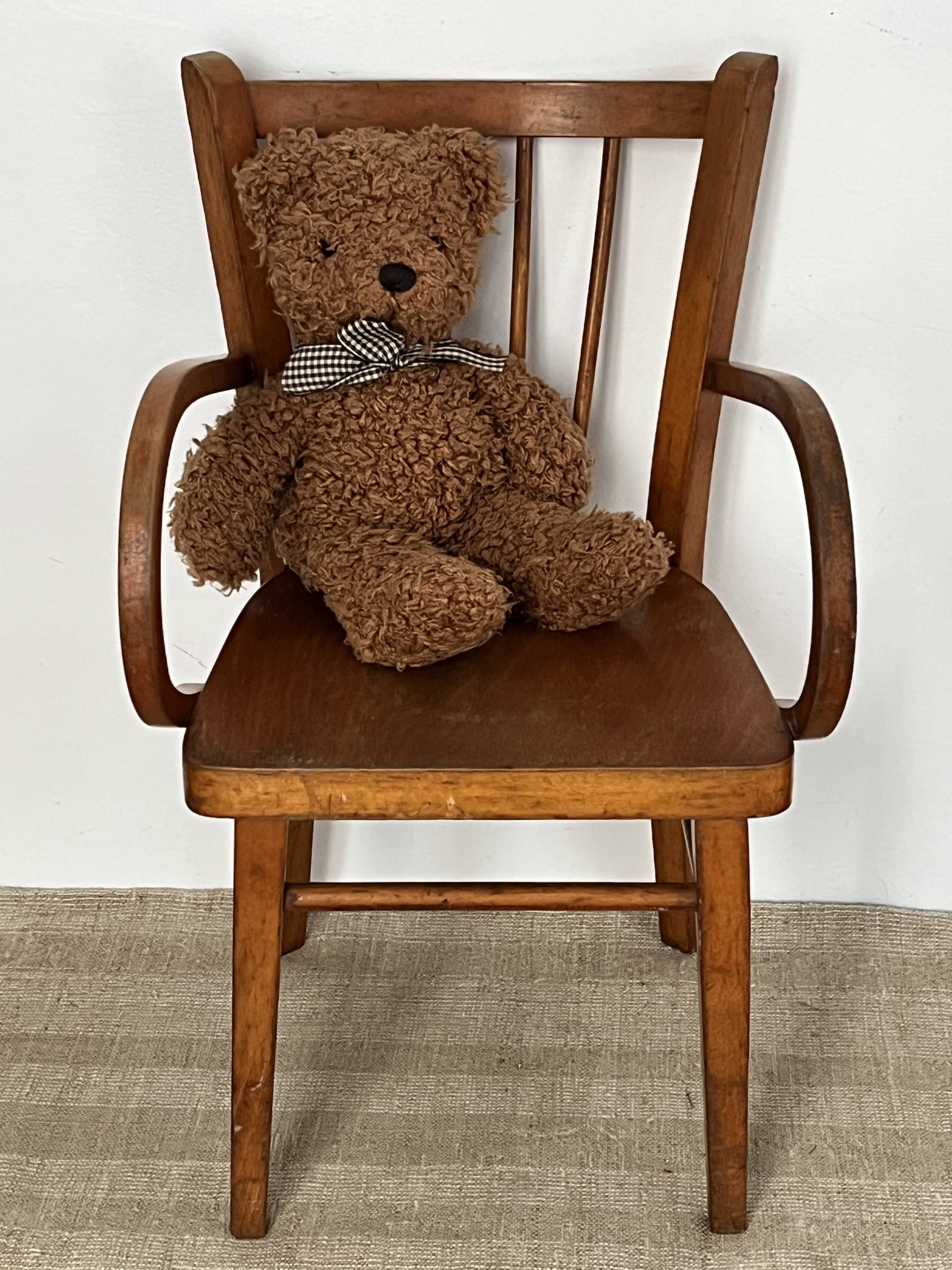 Curved wooden child's armchair - early 20th century