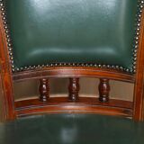 Modern captain's chair in leather, beech frame, adjustable.