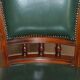 Modern captain's chair in leather, beech frame, adjustable.