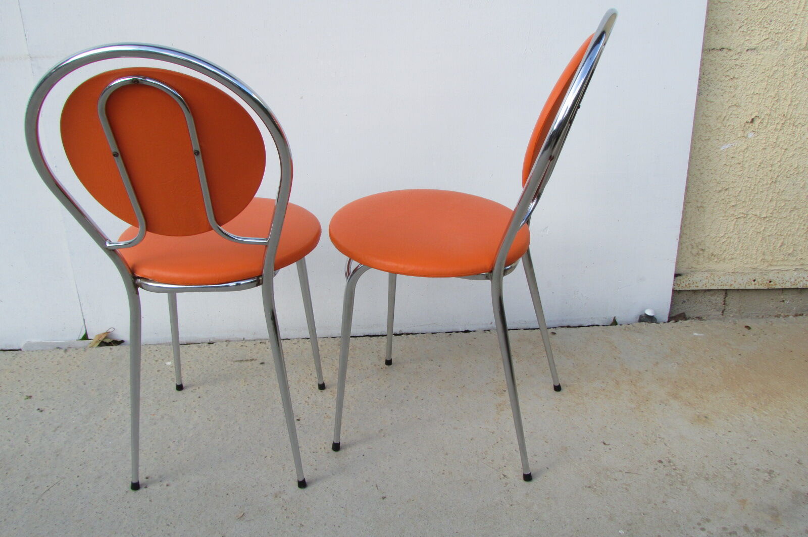 Pair of orange vintage chairs